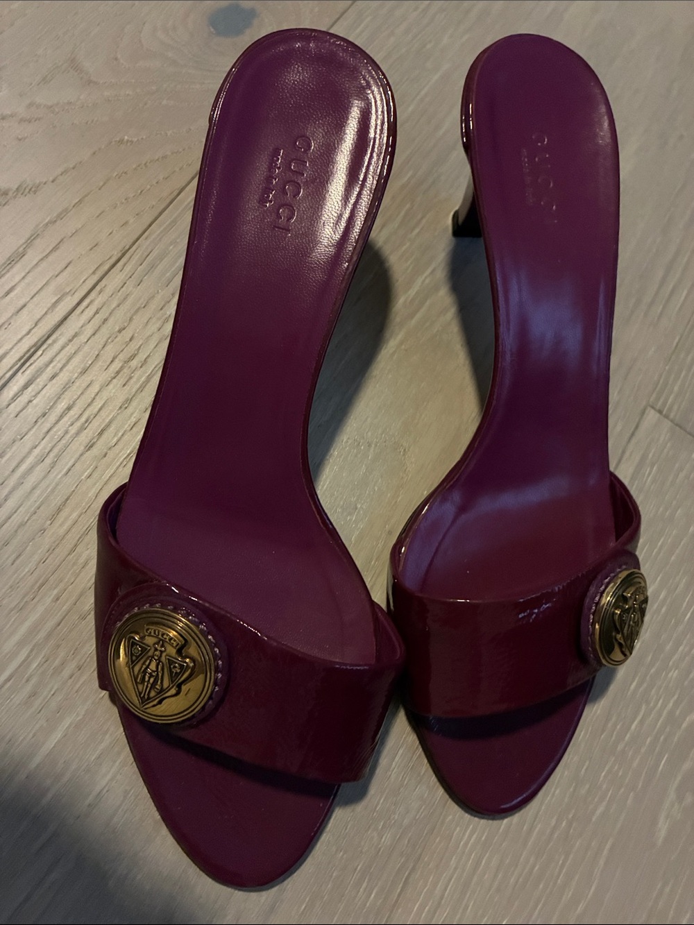 Gucci Burgundy Patent Slide Mules with Gold Medallion